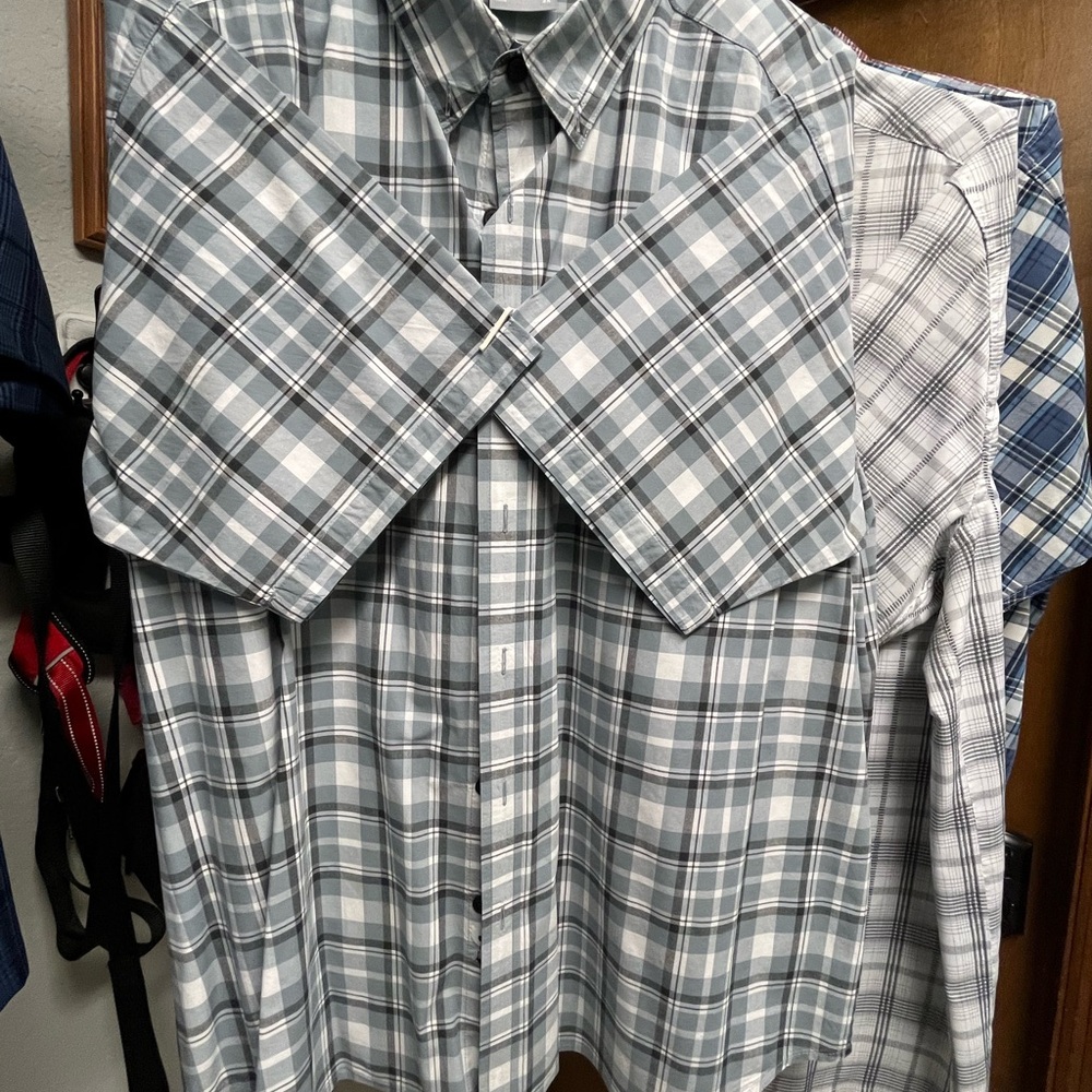 Lot of 4 men’s button down casual shirts.